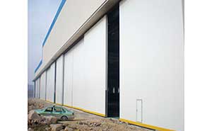 遼寧紅沿河核電公司-平開工業(yè)門案例 - 中出網(wǎng)-智能出入口與停車充電門戶