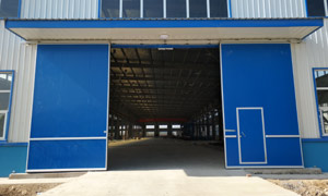 河南四建股份公司工業(yè)雙開(kāi)推拉門(mén)案例 - 中出網(wǎng)-智能出入口與停車充電門(mén)戶