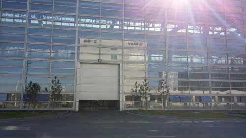 西北重工工業(yè)提升門案例 - 中出網(wǎng)-智能出入口與停車充電門戶